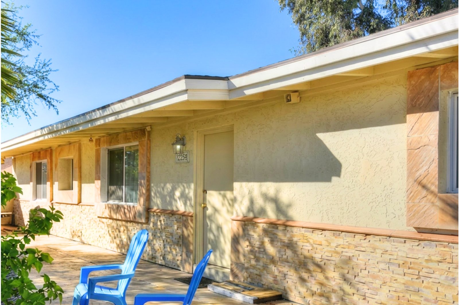 A house exterior clad in SBC concrete stone wall panels.