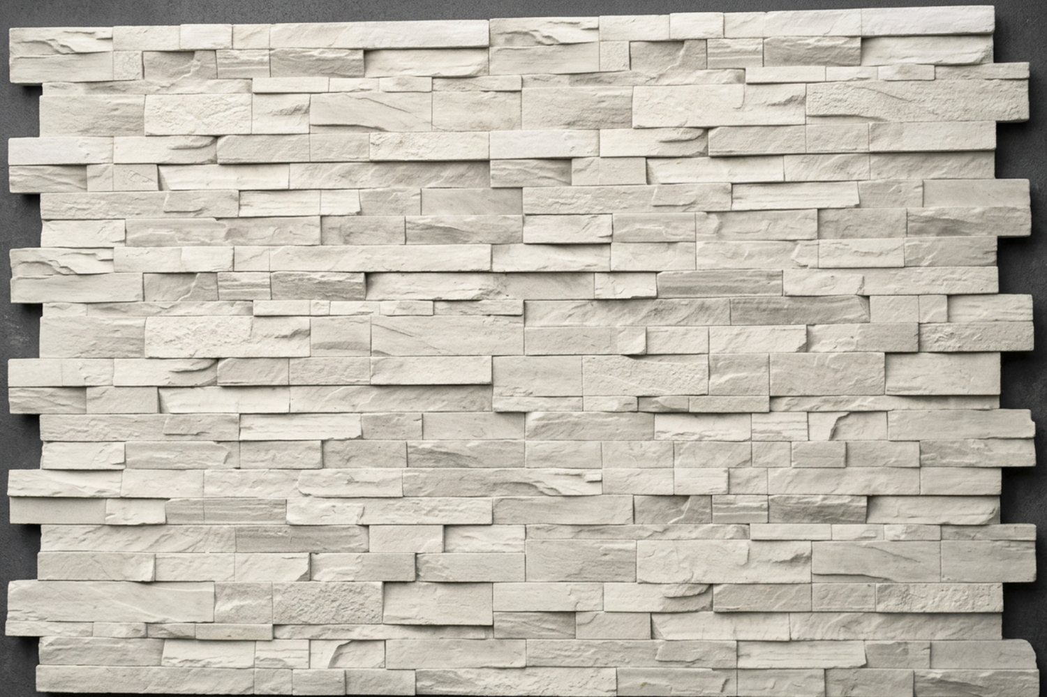 A white SBC concrete veneer stone wall panel.